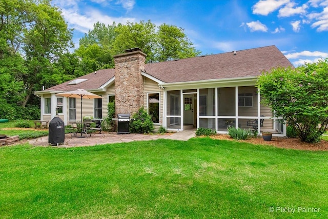39W889 Deer Run Dr, Saint Charles, IL 60175 - rear view of property with a chimney, a patio area, a yard, a sunroom, and a shingled roof