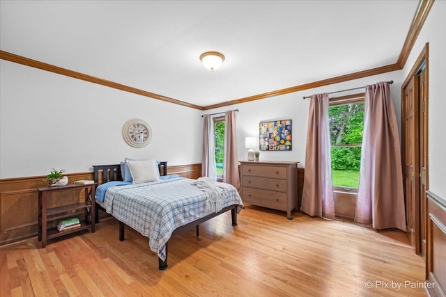 39W889 Deer Run Dr, Saint Charles, IL 60175 - bedroom featuring ornamental molding, wainscoting, light wood finished floors, and multiple windows