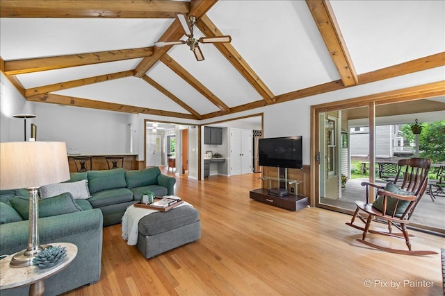 39W889 Deer Run Dr, Saint Charles, IL 60175 - living area featuring plenty of natural light, light wood-style floors, a ceiling fan, high vaulted ceiling, and beam ceiling