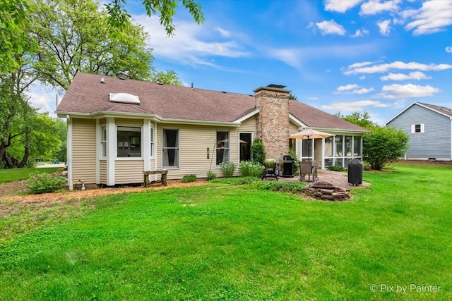 39W889 Deer Run Dr, Saint Charles, IL 60175 - back of property with a sunroom, a yard, a chimney, a patio area, and a shingled roof