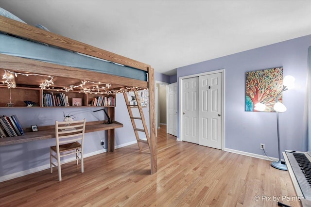 39W889 Deer Run Dr, Saint Charles, IL 60175 - bedroom with baseboards, wood finished floors, and a closet