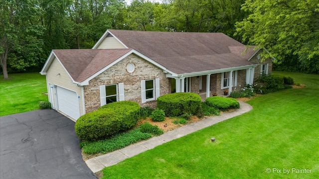 39W889 Deer Run Dr, Saint Charles, IL 60175 - ranch-style house featuring a shingled roof, a front yard, and a garage