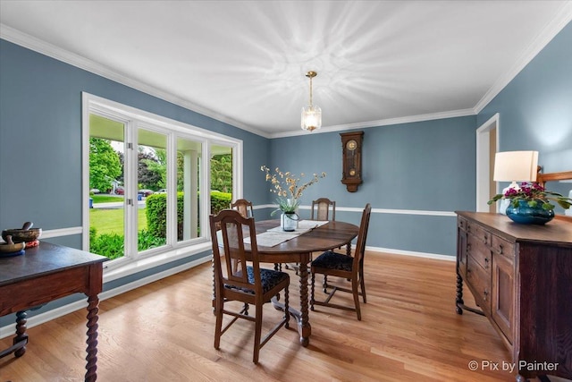 39W889 Deer Run Dr, Saint Charles, IL 60175 - dining area with light wood-type flooring, ornamental molding, baseboards, and a chandelier