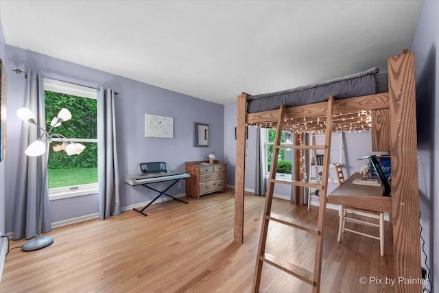 39W889 Deer Run Dr, Saint Charles, IL 60175 - bedroom with wood finished floors and baseboards