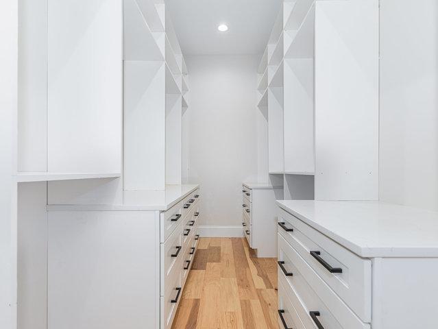 223 Center St, Naperville, IL 60540 - walk in closet featuring light wood-style floors