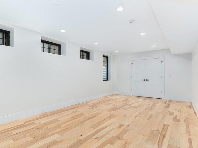 223 Center St, Naperville, IL 60540 - basement with wood finished floors, recessed lighting, and baseboards