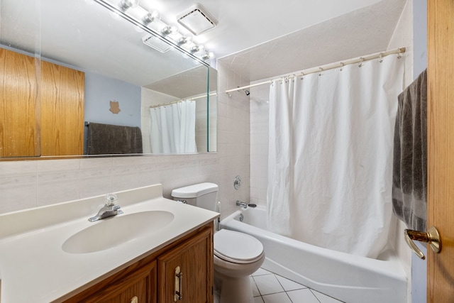 5401 N Milwaukee Ave Unit 1A, Chicago, IL 60630 - full bath featuring vanity, tile patterned floors, shower / bath combo with shower curtain, and toilet