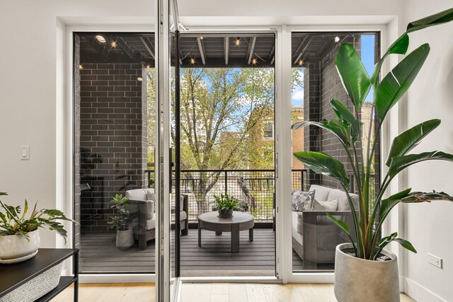 4906 N Kenmore Ave Unit 2S, Chicago, IL 60640 - doorway to outside with wood finished floors