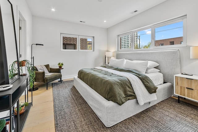 4906 N Kenmore Ave Unit 2S, Chicago, IL 60640 - bedroom featuring light wood-type flooring, recessed lighting, and baseboards