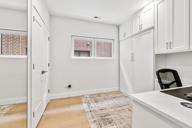 4906 N Kenmore Ave Unit 2S, Chicago, IL 60640 - unfurnished office with baseboards and light wood-type flooring