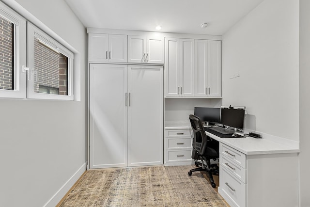 4906 N Kenmore Ave Unit 2S, Chicago, IL 60640 - office area featuring built in desk, baseboards, and recessed lighting