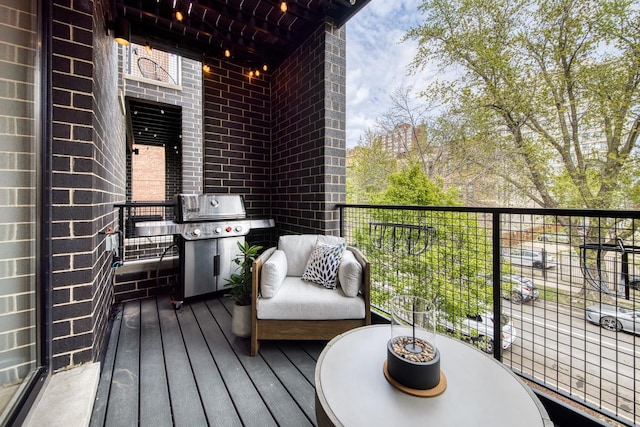 4906 N Kenmore Ave Unit 2S, Chicago, IL 60640 - wooden terrace with a grill