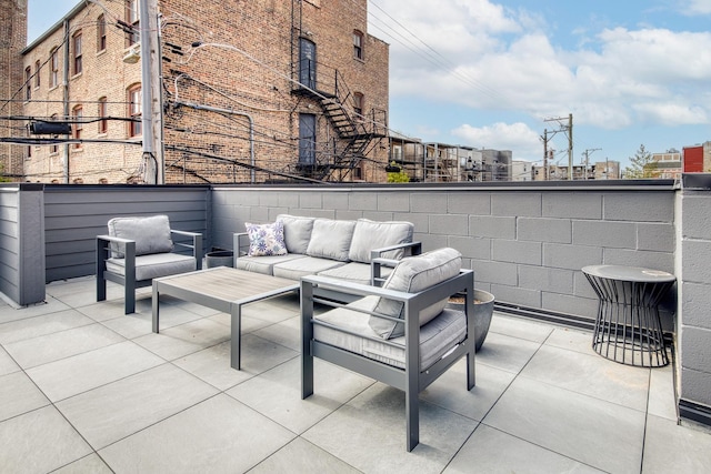 4906 N Kenmore Ave Unit 2S, Chicago, IL 60640 - view of patio featuring an outdoor living space