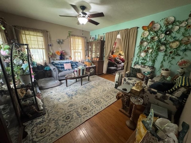 309 11th Ave, Sterling, IL 61081 - living room featuring wood finished floors and ceiling fan
