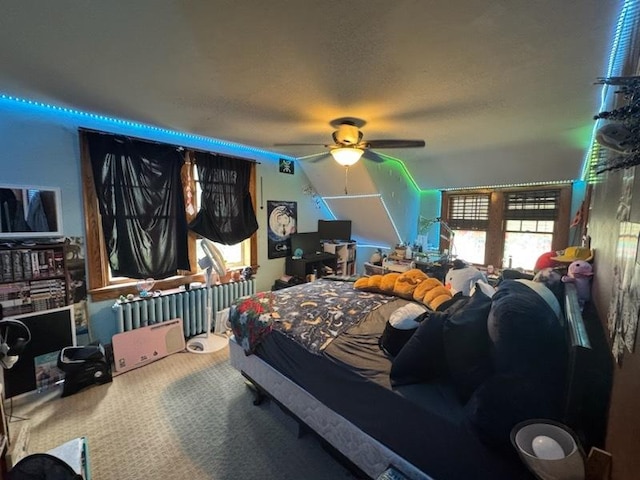 309 11th Ave, Sterling, IL 61081 - bedroom with carpet floors, a ceiling fan, and vaulted ceiling