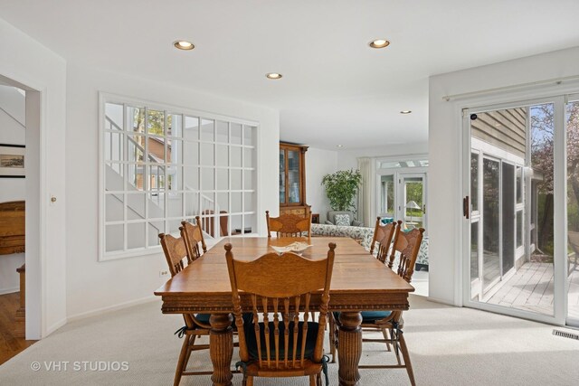 22585 N Ruth Ct, Kildeer, IL 60047 - carpeted dining area with plenty of natural light, recessed lighting, french doors, and baseboards
