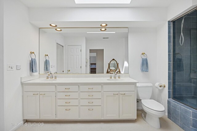 22585 N Ruth Ct, Kildeer, IL 60047 - bathroom featuring toilet, double vanity, a tile shower, tile patterned flooring, and recessed lighting