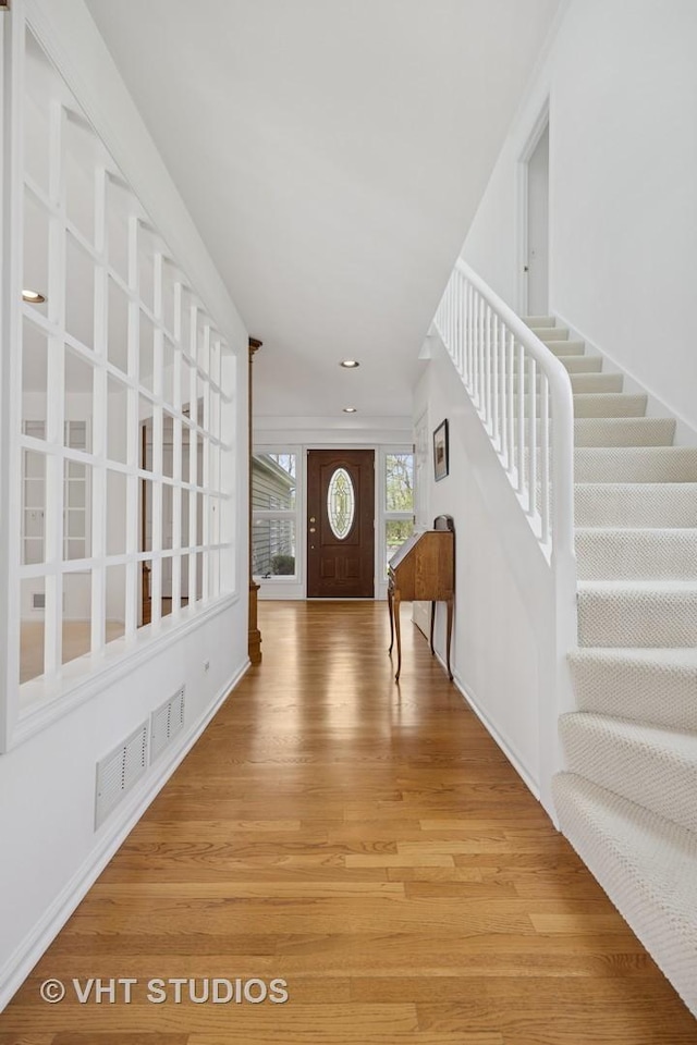 22585 N Ruth Ct, Kildeer, IL 60047 - entrance foyer with light wood-type flooring, stairway, recessed lighting, and baseboards