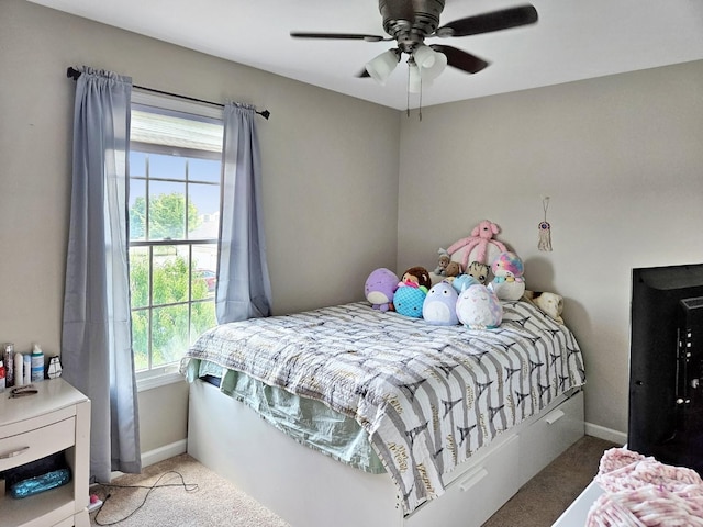 1409 Hull St, Normal, IL 61761 - bedroom with carpet, multiple windows, baseboards, and a ceiling fan
