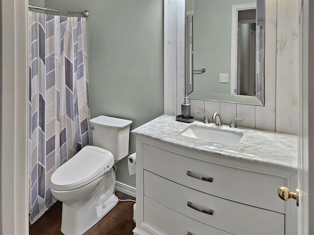 1409 Hull St, Normal, IL 61761 - bathroom featuring wood finished floors, vanity, toilet, and a shower with shower curtain