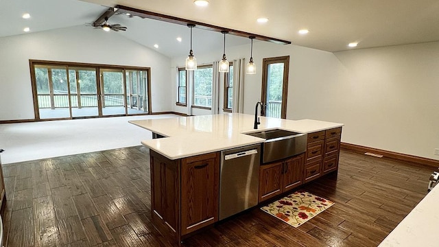 15501 Bishop Rd, Morrison, IL 61270 - kitchen featuring dishwasher, open floor plan, dark wood-style flooring, a sink, and light countertops