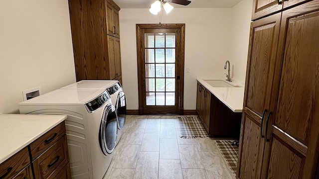 15501 Bishop Rd, Morrison, IL 61270 - washroom with cabinet space, separate washer and dryer, ceiling fan, and baseboards