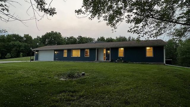 15501 Bishop Rd, Morrison, IL 61270 - ranch-style house with a front yard and a garage