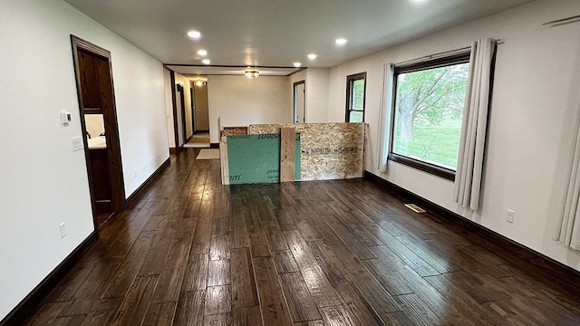 15501 Bishop Rd, Morrison, IL 61270 - empty room with dark wood-type flooring, recessed lighting, and baseboards