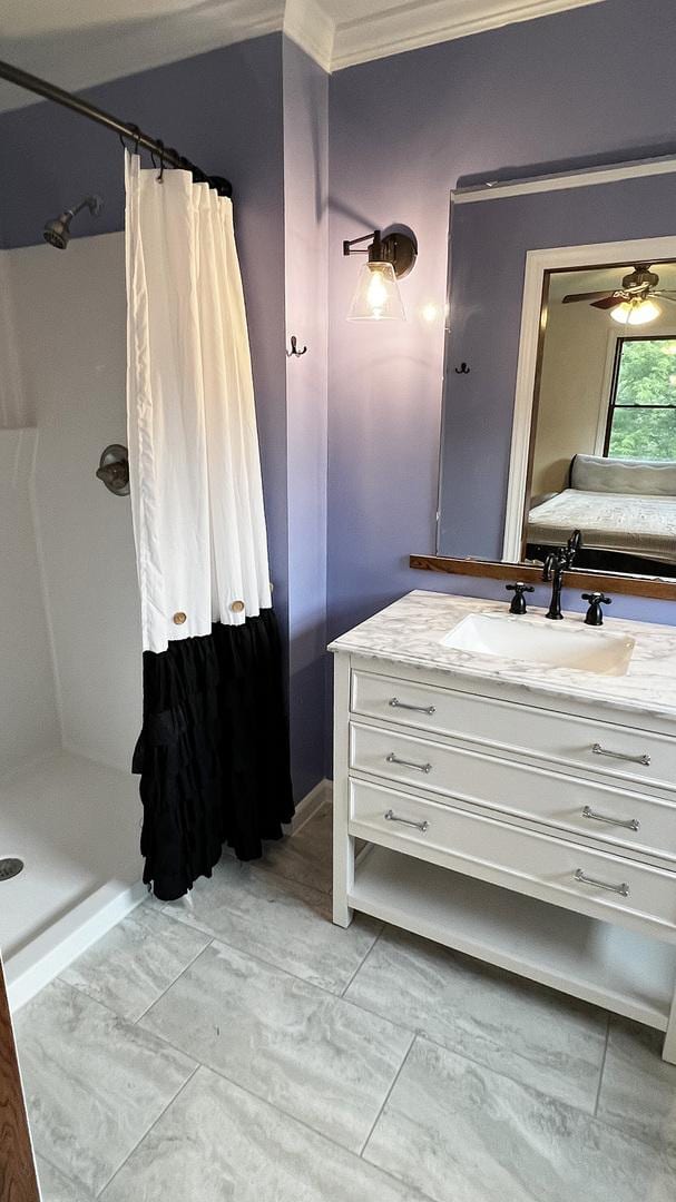 15501 Bishop Rd, Morrison, IL 61270 - full bath featuring crown molding, vanity, a shower with shower curtain, ensuite bath, and marble look tiles
