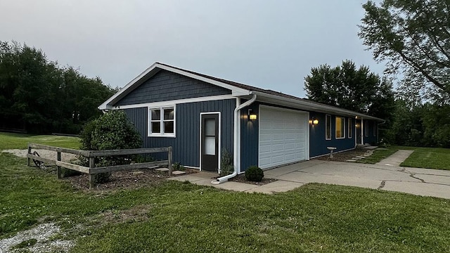 15501 Bishop Rd, Morrison, IL 61270 - view of front of home with an attached garage and a front lawn