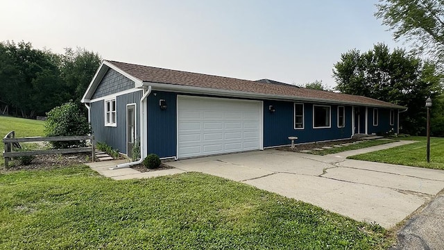 15501 Bishop Rd, Morrison, IL 61270 - single story home featuring a garage, a front lawn, and driveway