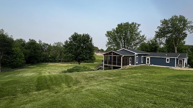 15501 Bishop Rd, Morrison, IL 61270 - view of green lawn with a sunroom