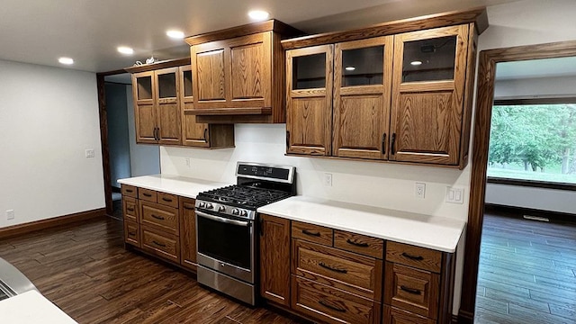 15501 Bishop Rd, Morrison, IL 61270 - kitchen with stainless steel range with gas cooktop, dark wood finished floors, recessed lighting, light countertops, and baseboards