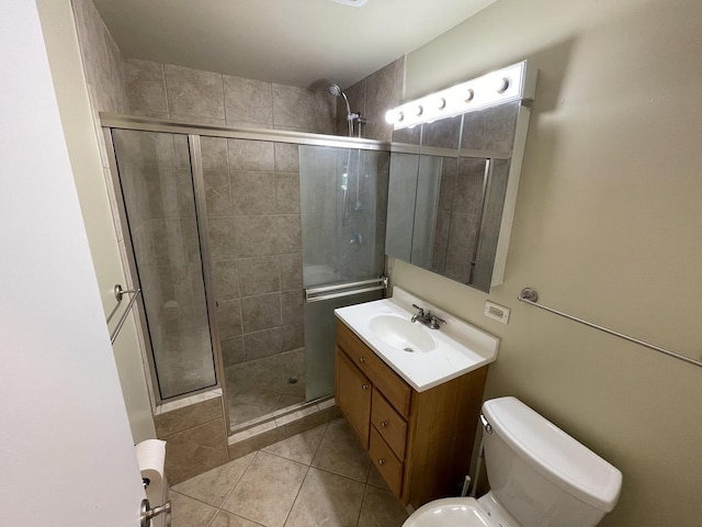 11 Shagbark Rd, Lake Bluff, IL 60044 - bathroom featuring a shower stall, tile patterned floors, vanity, and toilet