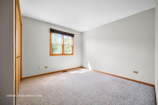 211 Lorien Ct, East Dundee, IL 60118 - empty room with carpet floors and baseboards
