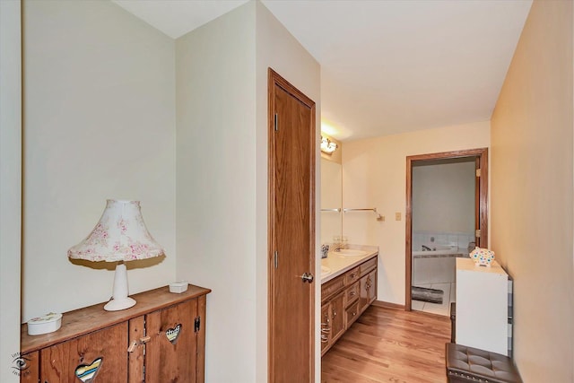 8702 Bally Castle Ln, Tinley Park, IL 60487 - bathroom featuring double vanity and wood finished floors