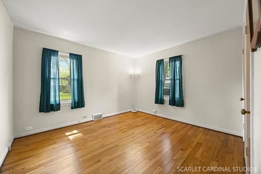 275 E Division St, Villa Park, IL 60181 - unfurnished room with wood finished floors and baseboards