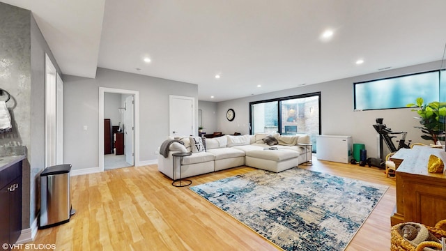 1203 W Superior St Unit 1C, Chicago, IL 60642 - living room featuring light wood-style floors, recessed lighting, and baseboards