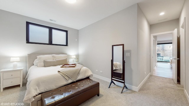1203 W Superior St Unit 1C, Chicago, IL 60642 - bedroom featuring baseboards and light colored carpet