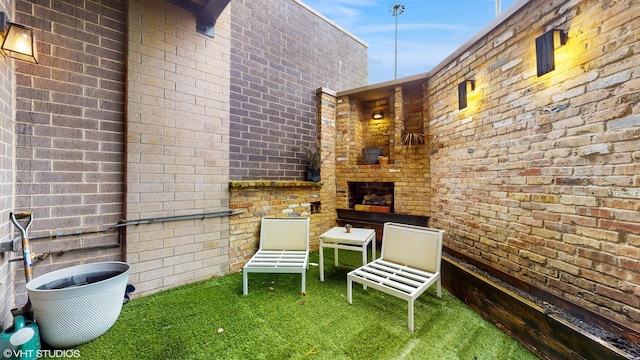1203 W Superior St Unit 1C, Chicago, IL 60642 - view of patio with exterior fireplace