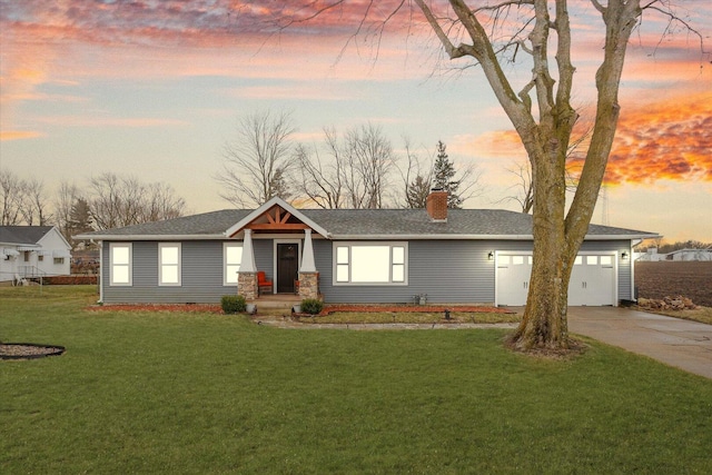 2225 County Road 1700 N, Saint Joseph, IL 61873 - view of front of home featuring concrete driveway, a chimney, a garage, and a front yard