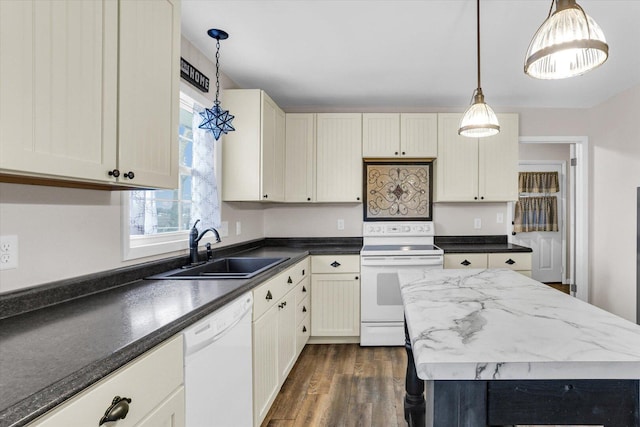 2225 County Road 1700 N, Saint Joseph, IL 61873 - kitchen featuring white appliances, a sink, dark wood-type flooring, hanging light fixtures, and a kitchen island