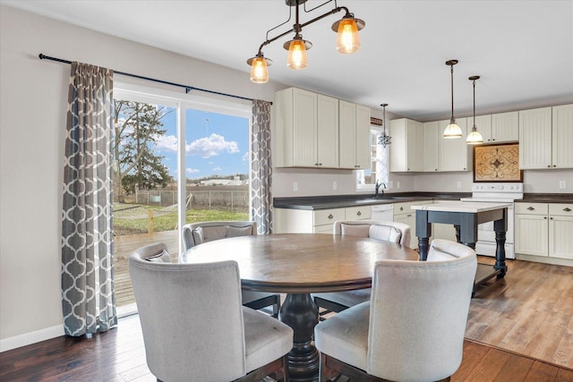 2225 County Road 1700 N, Saint Joseph, IL 61873 - dining room with dark wood-style flooring and baseboards