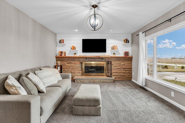 2225 County Road 1700 N, Saint Joseph, IL 61873 - living area with carpet, baseboards, a fireplace, recessed lighting, and a chandelier