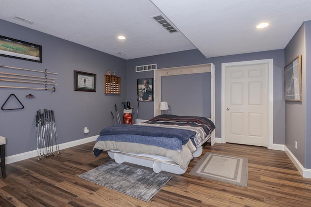 1710 Fraser Dr, Normal, IL 61761 - bedroom with baseboards, wood finished floors, and recessed lighting
