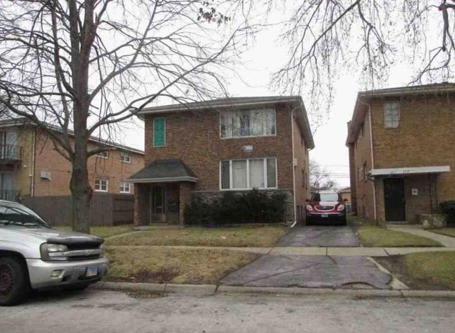 375 Madison Ave, Calumet City, IL 60409 - traditional-style home featuring driveway