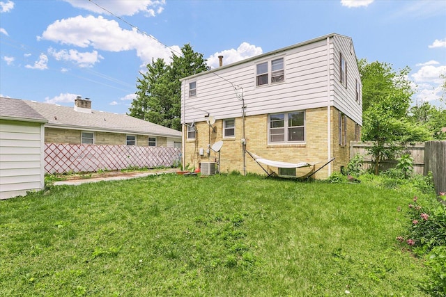 1117 W Springfield Ave, Champaign, IL 61821 - rear view of property featuring brick siding and cooling unit