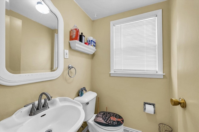 1117 W Springfield Ave, Champaign, IL 61821 - bathroom with a sink and toilet