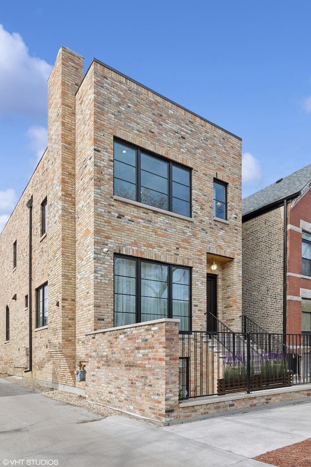 2014 N Winchester Ave, Chicago, IL 60614 - view of front of home featuring a fenced front yard and brick siding