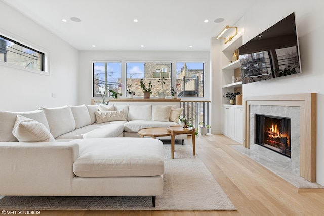 2014 N Winchester Ave, Chicago, IL 60614 - living area with light wood-style flooring, recessed lighting, and a high end fireplace